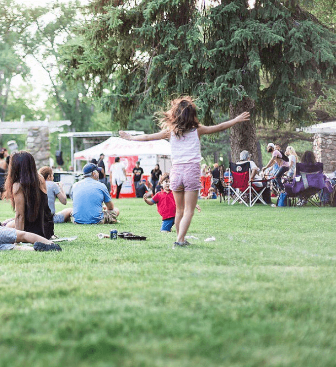 family enjoying a food truck night at a Food Truck League community event