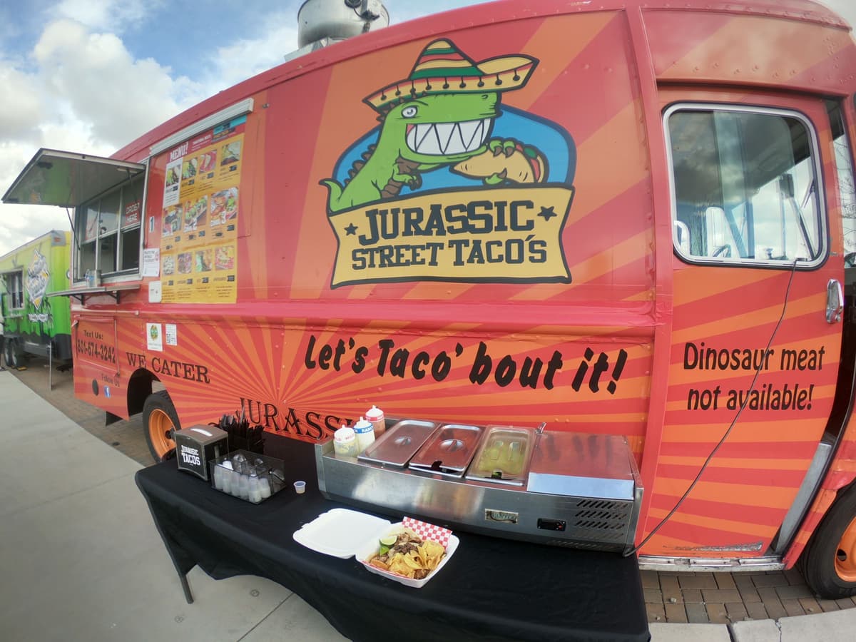 Taco truck catering vendor at a Food Truck League event ready to serve guests